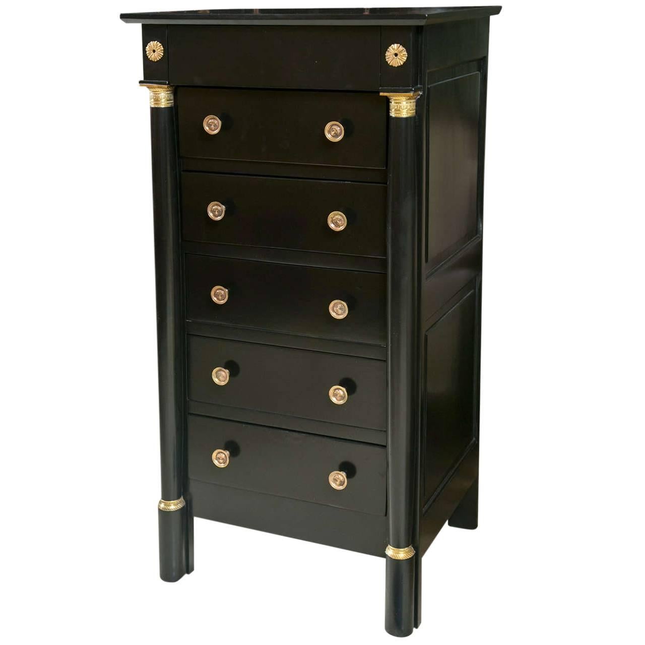 French Empire Style Ebonized Chest of Drawers Decorated with Brass Hardware