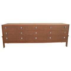 Cassettone a nove cassetti in palissandro e teak