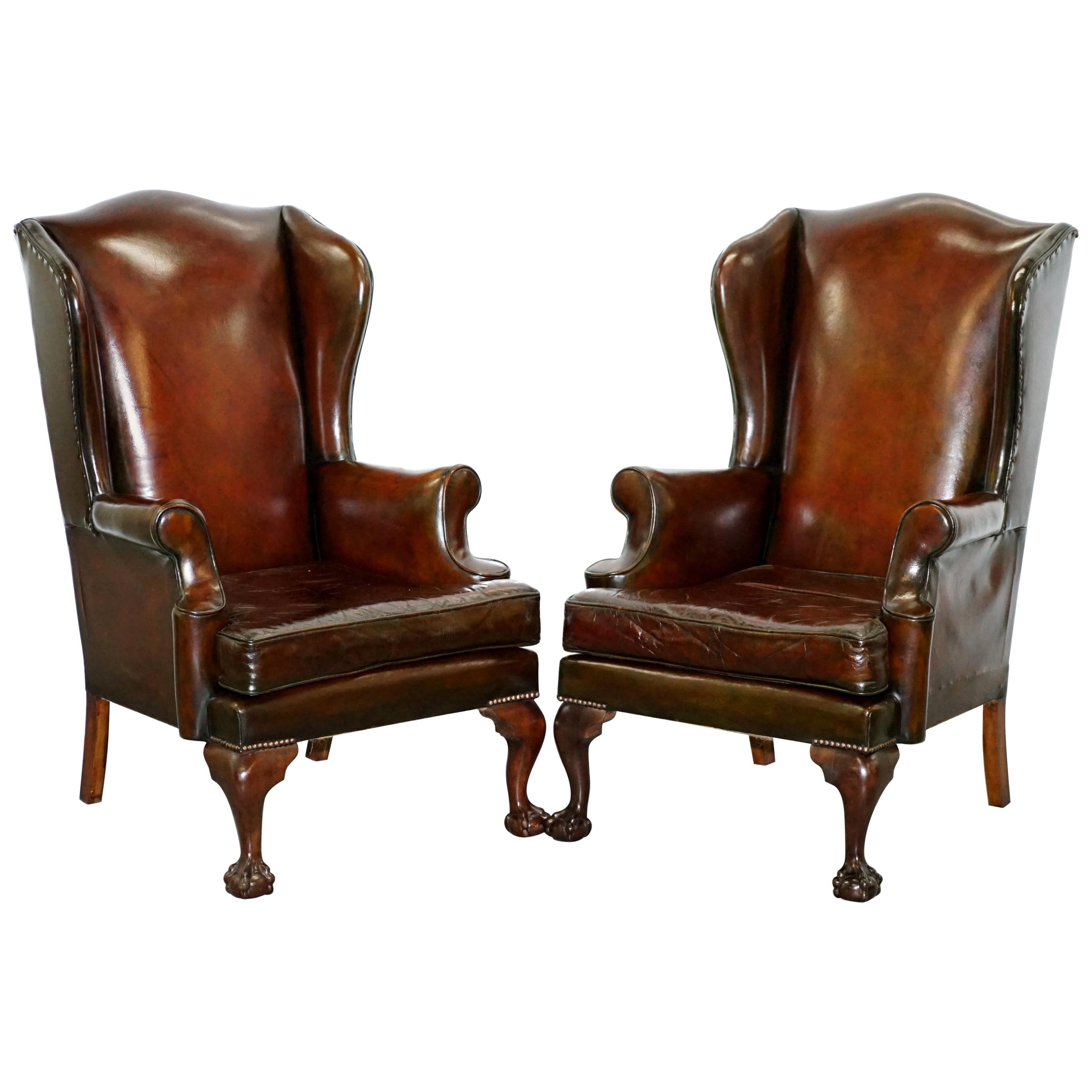 Stunning Pair of Fully Restored Claw and Wingback Cigar Brown Leather Armchairs