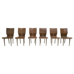 Set of Six Used Curved Wood Chairs in the Style of Ilmari Tapiovaara, Finland