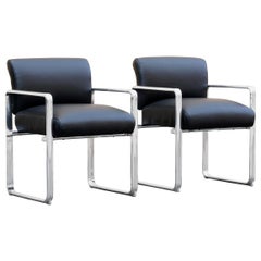 Pair of 1960s Modern Polished Aluminum and Leather Armchairs