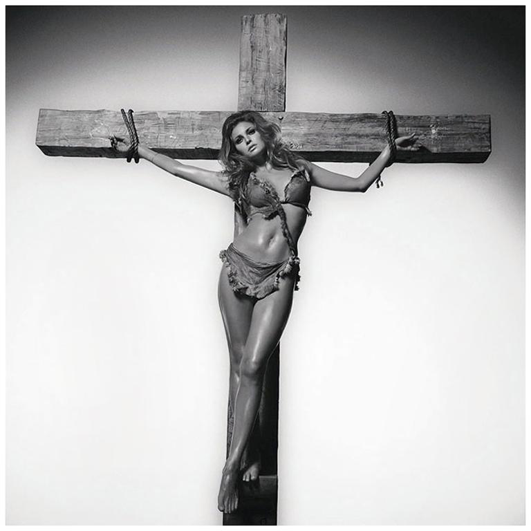 Terry O' Neill Black and White Photograph of Raquel Welch on the Cross, 1966 For Sale