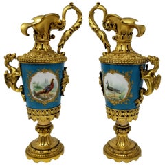 Pair of French Sèvres Porcelain Ormolu Mounted Ewers with Birds/Flowers/Dragons