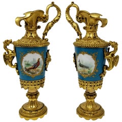 Antique Pair of French Sèvres Porcelain Ormolu Mounted Ewers with Birds/Flowers/Dragons