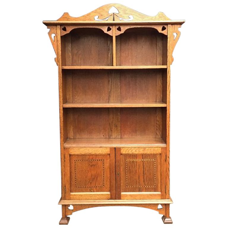 Arts & Crafts Oak Bookcase with Pierced Stylized Floral and Heart Cut-Outs