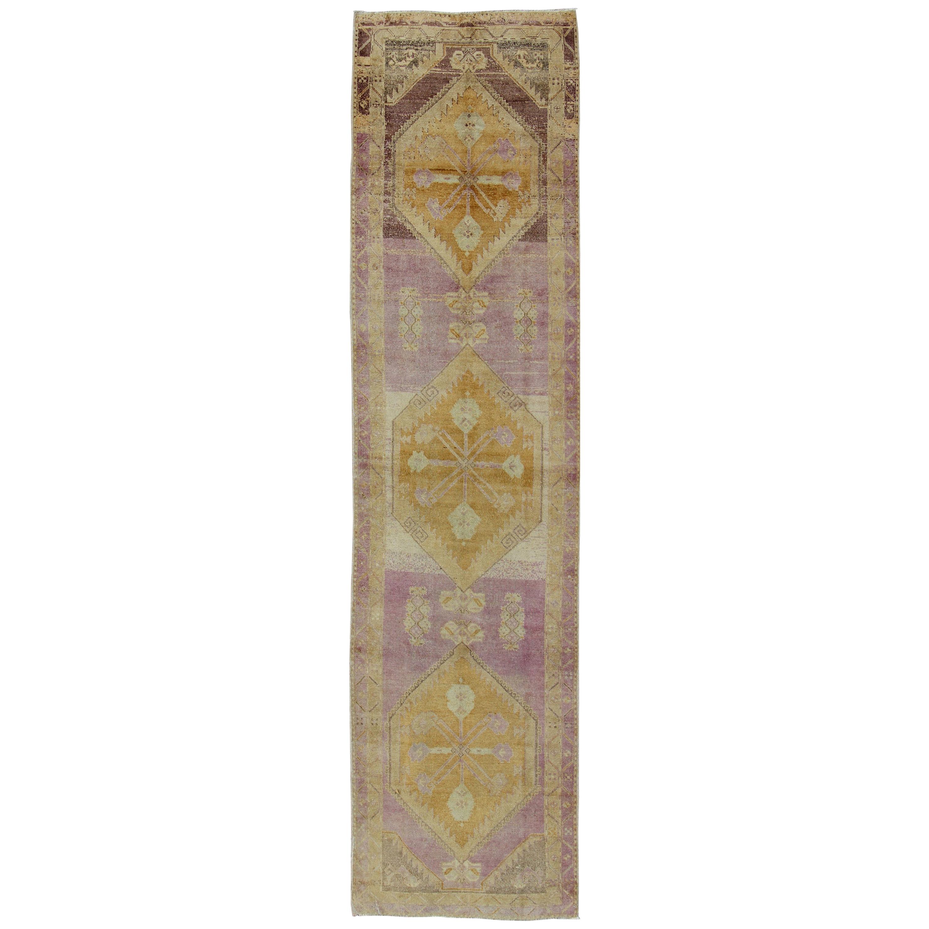 Antique Turkish Oushak Runner with Three Geometric Medallions in Purple Tones For Sale