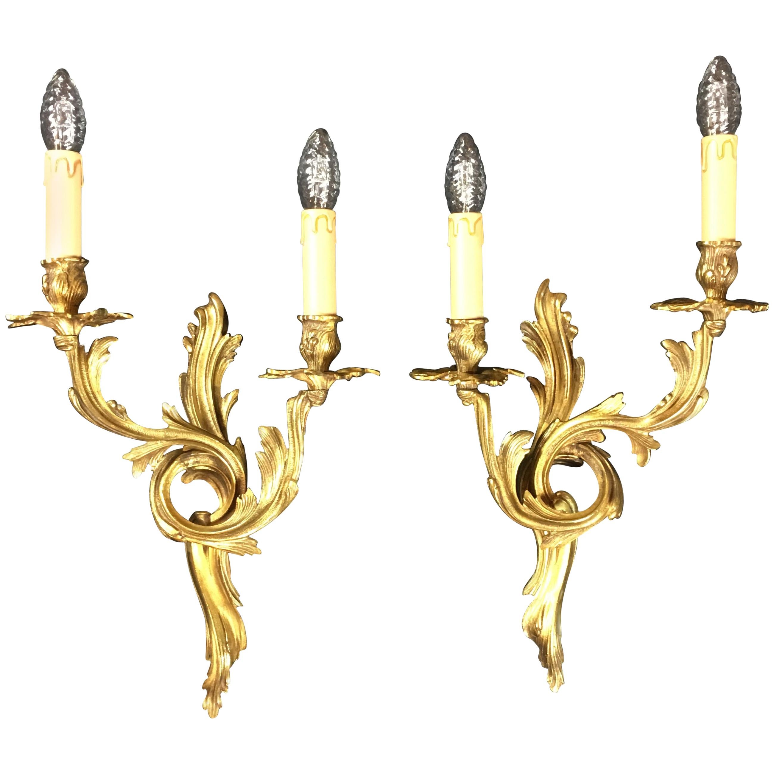 Pair of French Louis XV Style Rococo Gilt Bronze Two-Armed Sconces