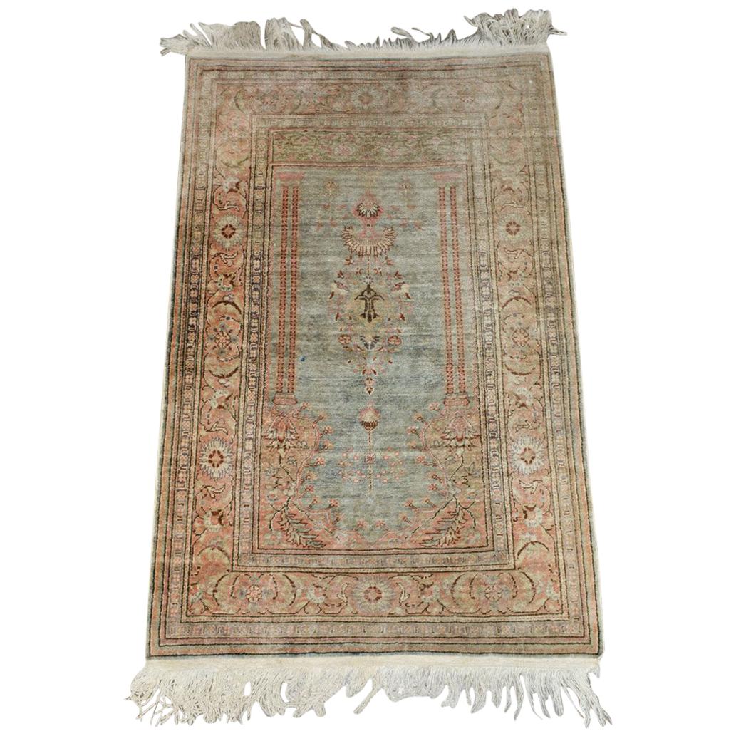 Tapis oriental ancien en laine à grappes de laine