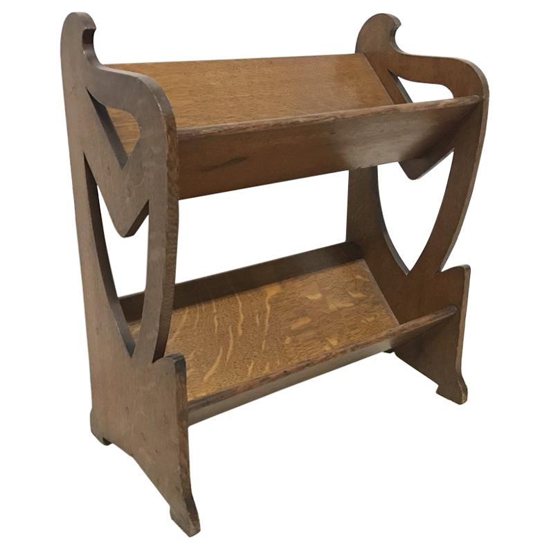 Liberty & Co. a Sweet Little Arts & Crafts Oak Bookcase with Stylised Cut-Outs