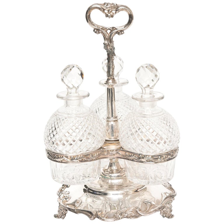 Antique Silverplate Floral Tantalus Set with Cut Glass Decanter Bottles