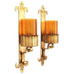 Pair of Spanish Gothic Style Gilt Wrought Wall Sconces with Amber Glass Shades