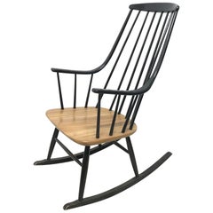 Lena Larsson, Made by Nesto, a Mid Century Ebonised Rocker with Sculptural Arms