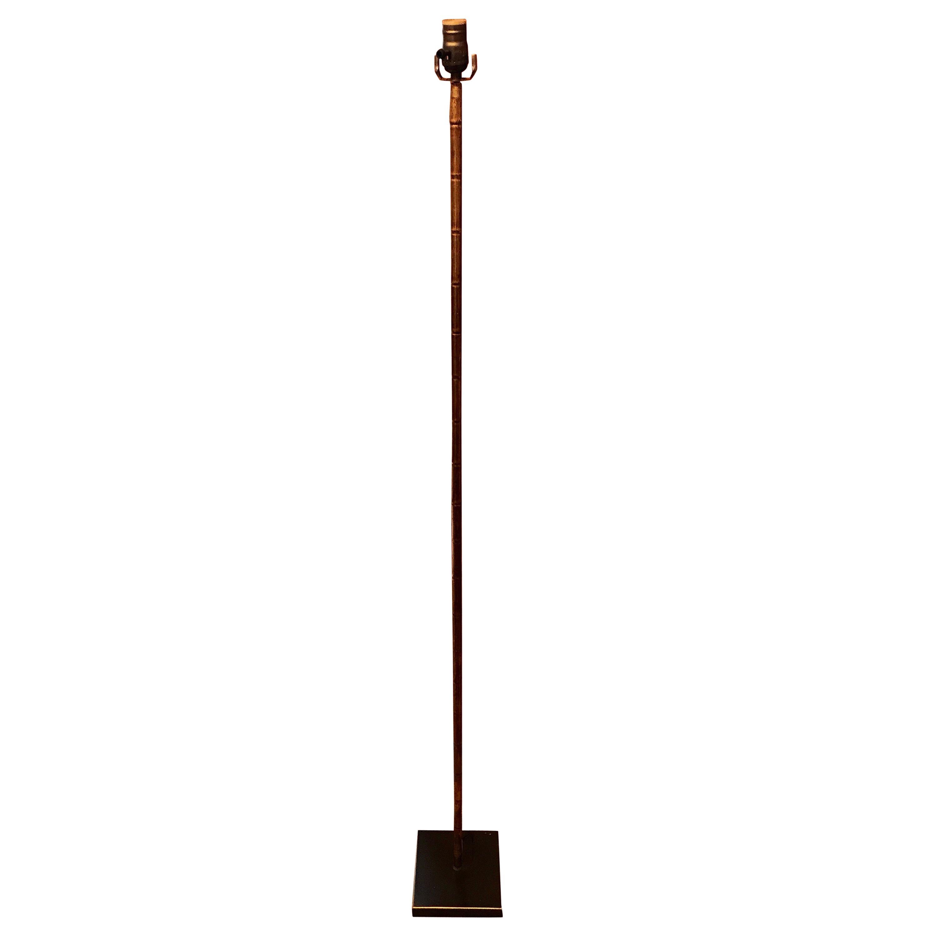 Tall and Narrow Gilt Faux Bamboo Floor Lamp in the Manner of Adnet For Sale