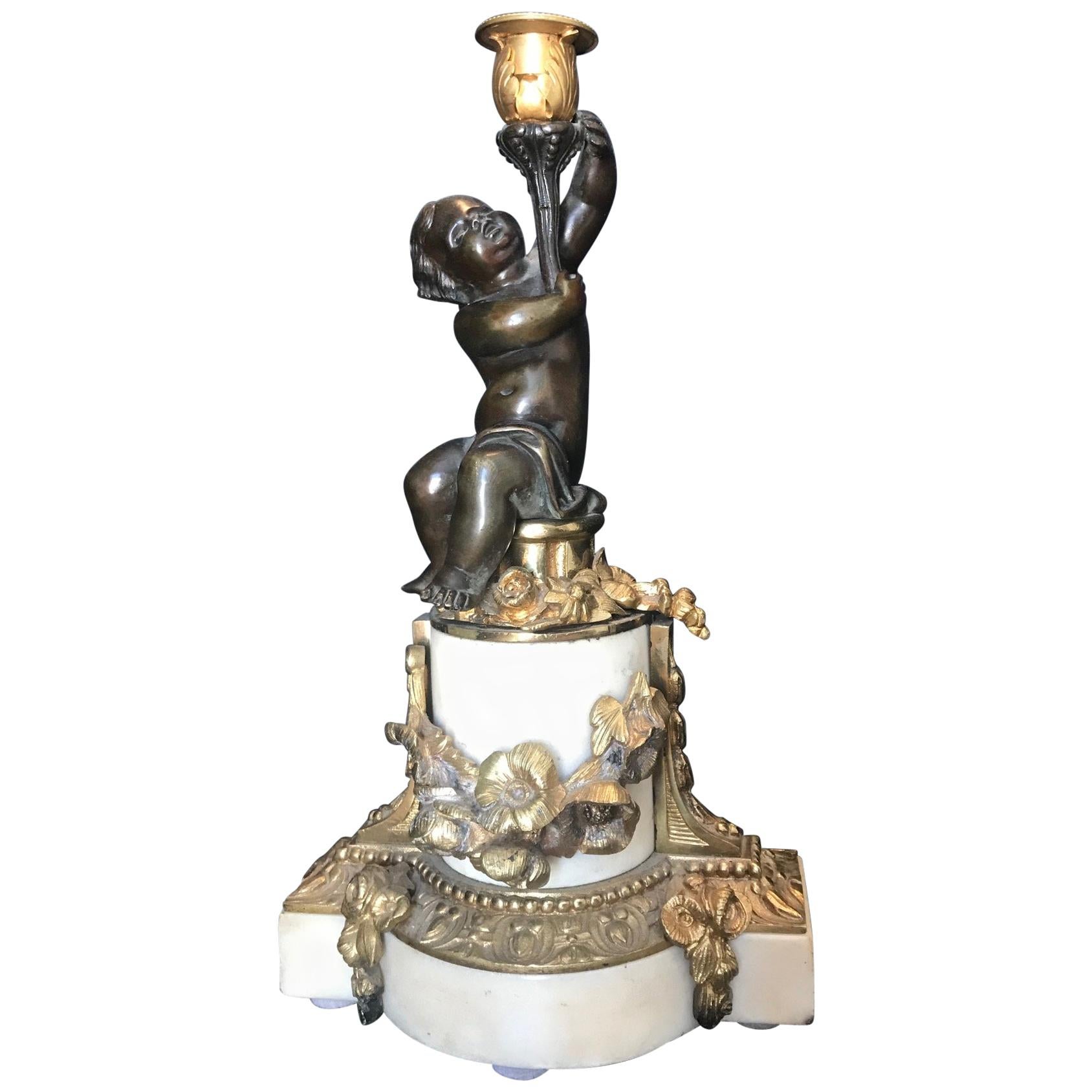Louis XVI Style Putto Ormolu Patinated Bronze and Marble Candlestick For Sale