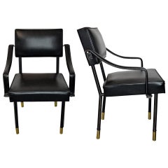 Coppia di poltrone Jacques Adnet