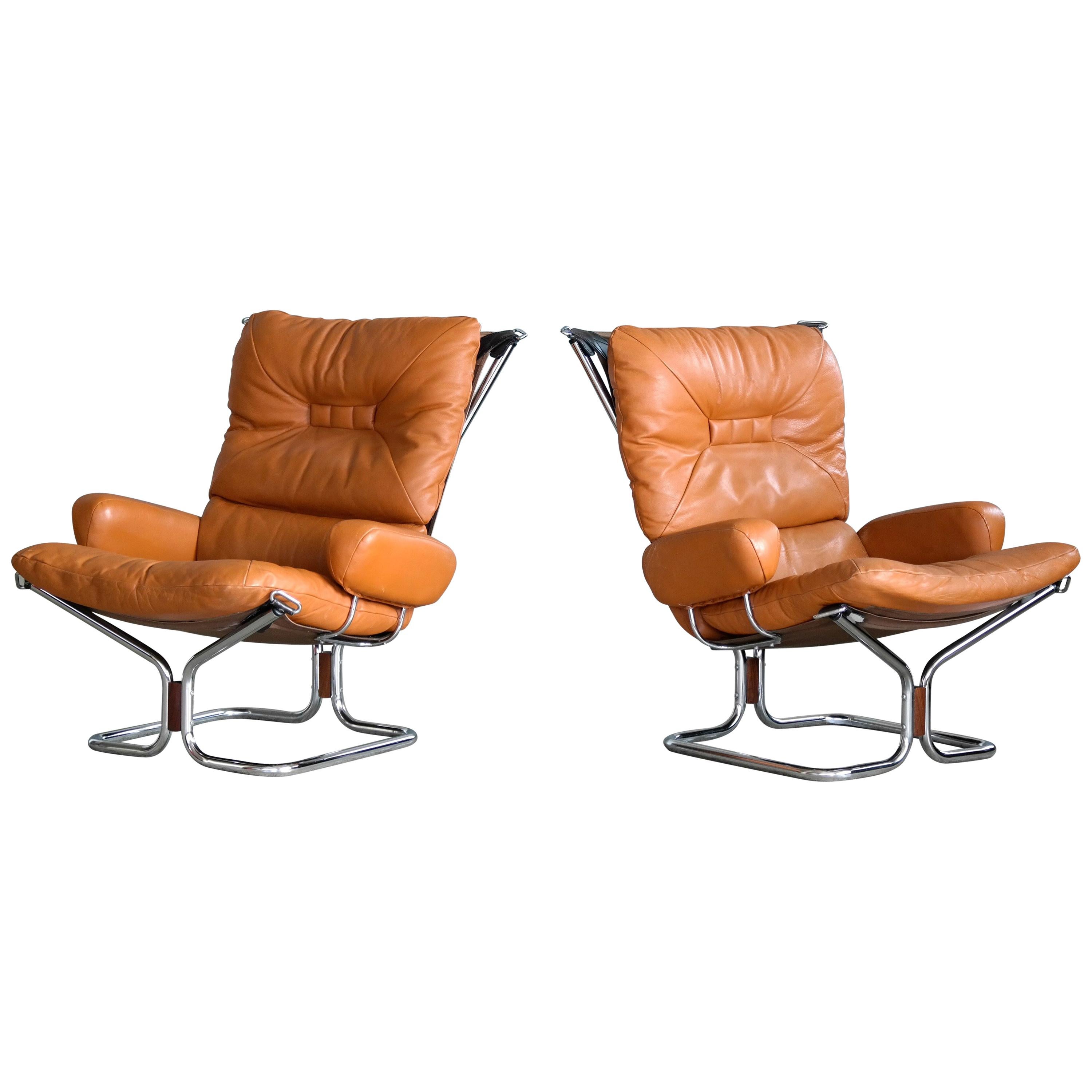 Pair of Relling Model "Wing" Lounge Chairs and Ottoman in Cognac Leather