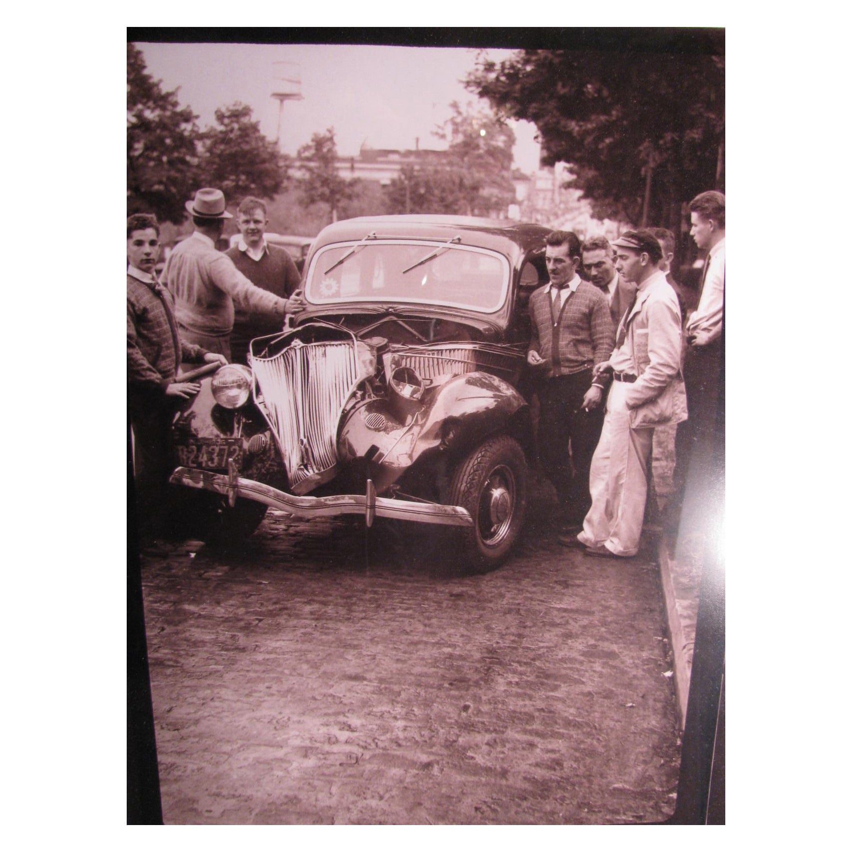 One off of a 1930 car crash in New Jersey during the depression. Taken from the original role of film. Onlookers galore dressed in period garb. Framed and ready to be hung. In excellent condition with minimal wear to the frame.