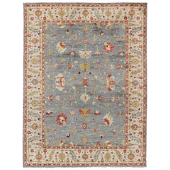 Large Angora Turkish Oushak Rug in Blue Background and Ivory with Hints of Red