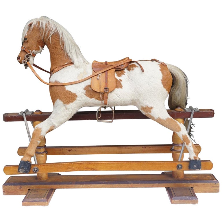 Antique Hide Covered Carved Wood Hobby Horse from The Schwarz Toy Bazaar  For Sale at 1stDibs | fao schwarz wooden rocking horse, fao schwarz rocking  horse, antique wooden hobby horse