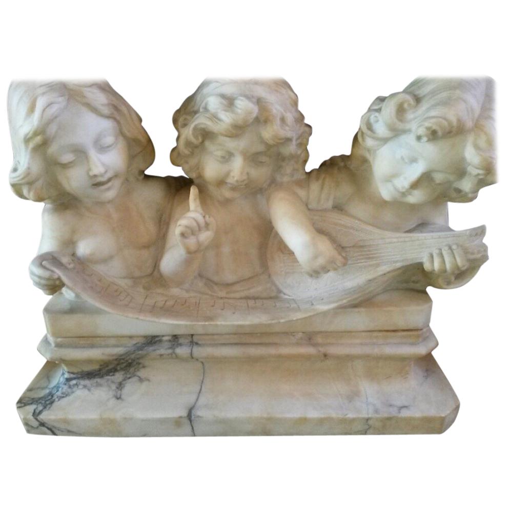 Adolfo Cipriani Carved Marble Musical Sculpture of Three Children Singing