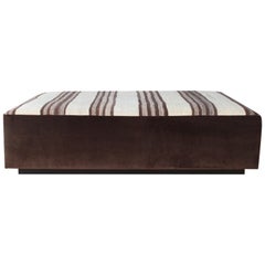 Upholstered Ottoman in a Vintage Striped Navajo Rug