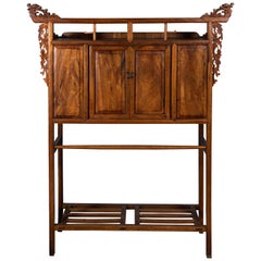 Chinese Elmwood Standing Coffer with Carved Dragons and Shelf, circa 1900