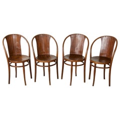 Juego de cuatro sillas de bistro austriacas de madera curvada de época Art Déco de Kohn