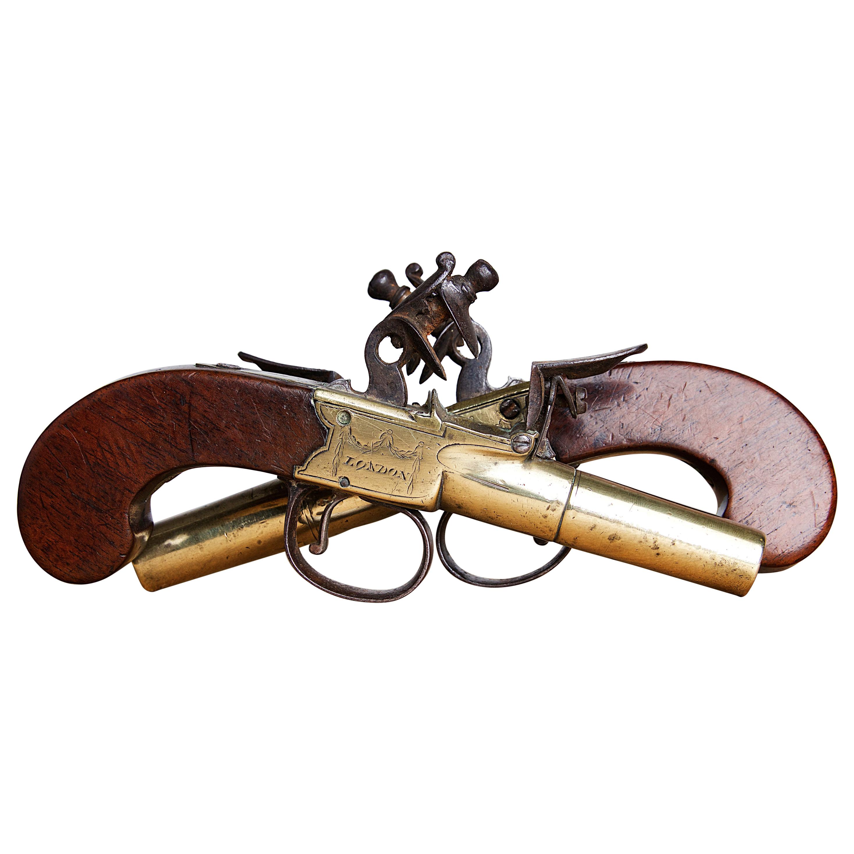 Pair of 18th Century Brass Pistols by John Twigg