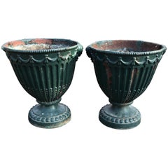 Pair of Small 19th Century Cast Iron Adams Urns in Old Green Paint