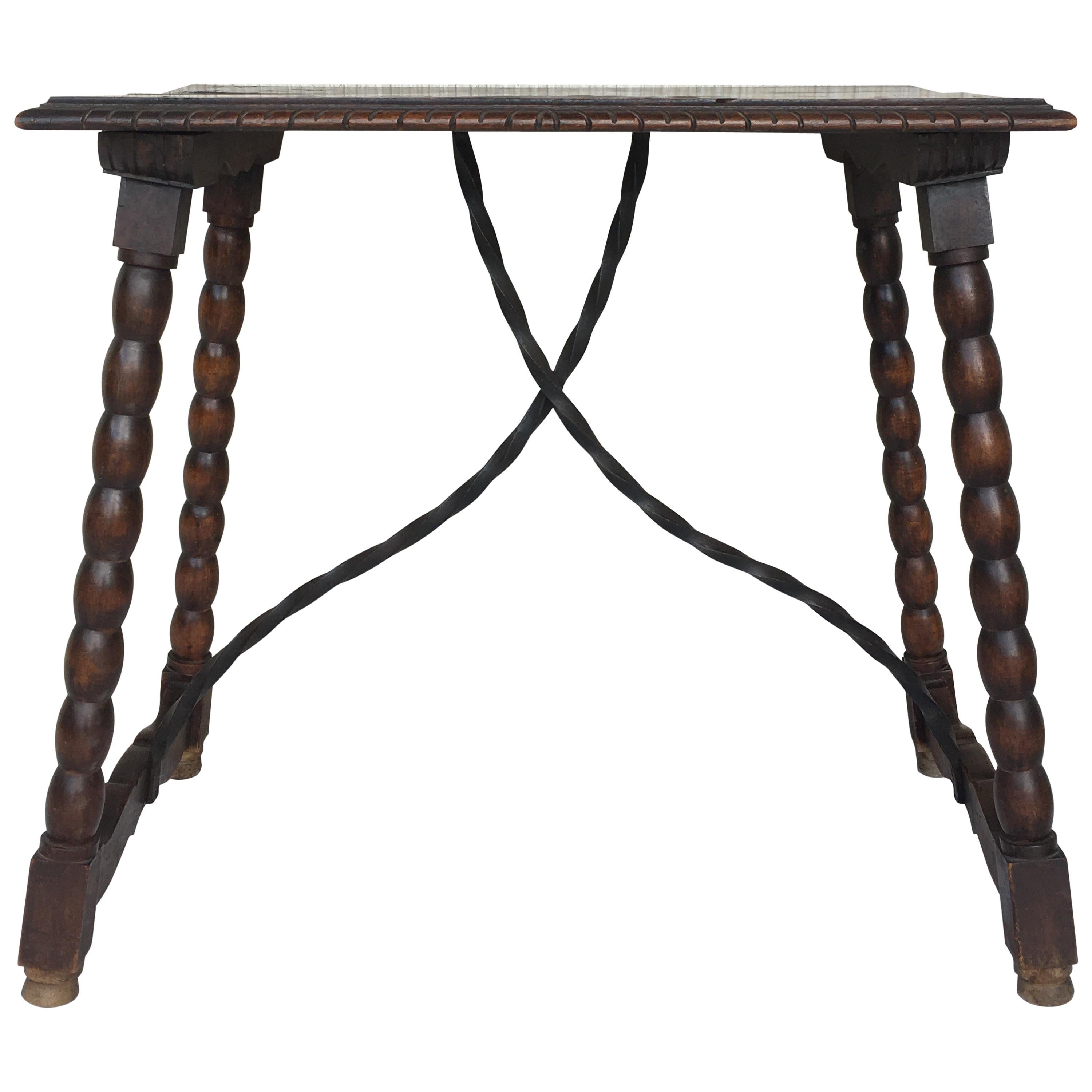 Spanish Baroque Side Table with Iron Stretcher and Carved Top in Walnut