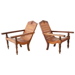 Pair of British Colonial Teak Plantation Chairs