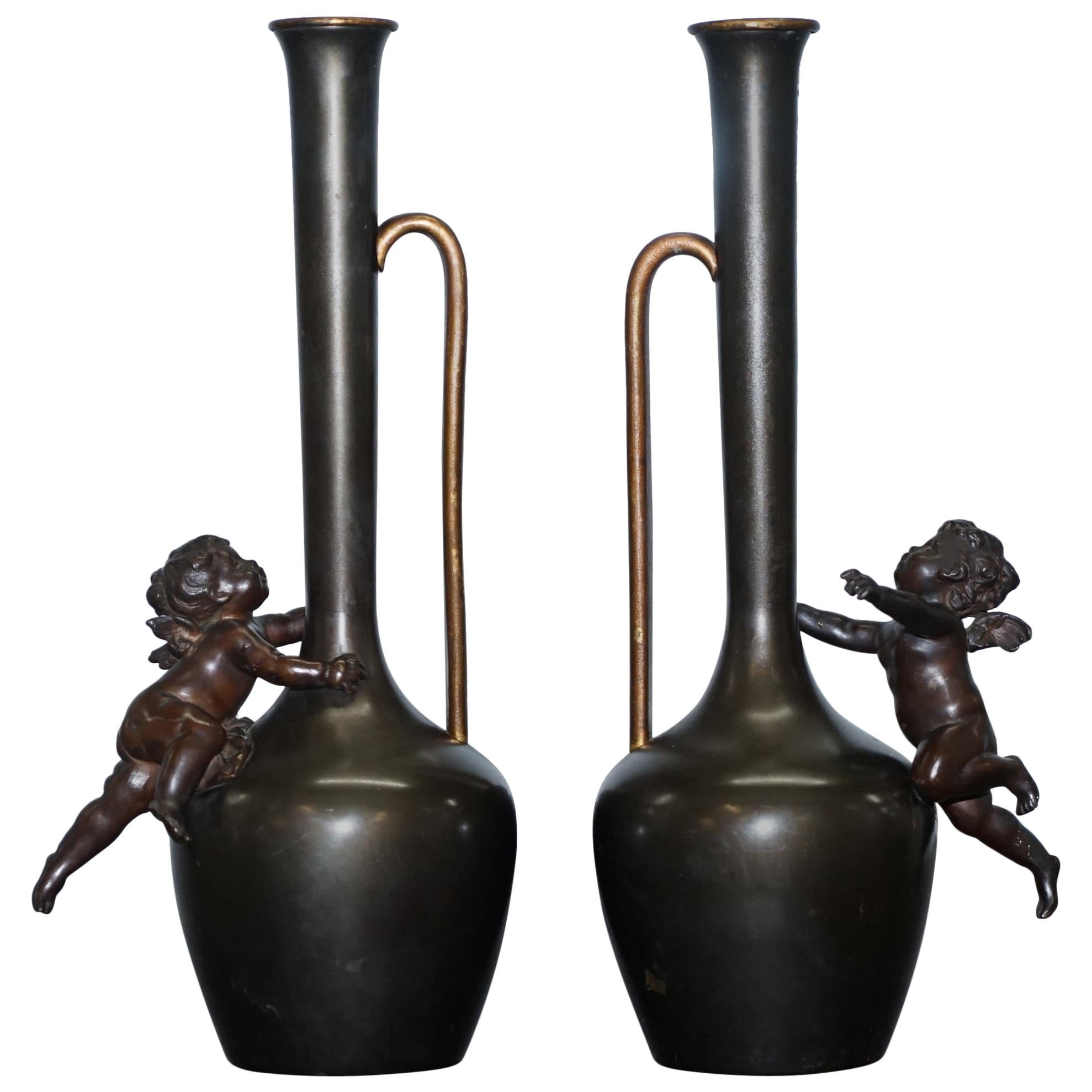 Pair of 1930s Vintage Bronze Jug Vase Urns with Little Cherub Angles Nice Find For Sale