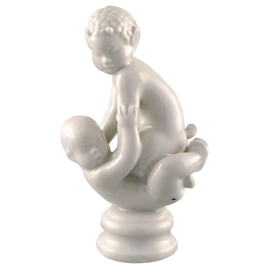 Rare Dahl Jensen Figure, Blanc de Chine, Faun Sitting on Baby