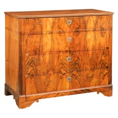 French 1870s Napoleon III Walnut Four-Drawer Commode with Bookmarked Veneer