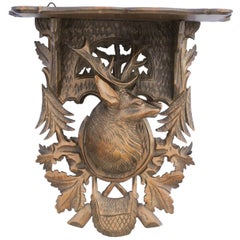 Antique Black Forest 1920s Oak Wall Bracket from Switzerland with Hand Carved Stag Motif