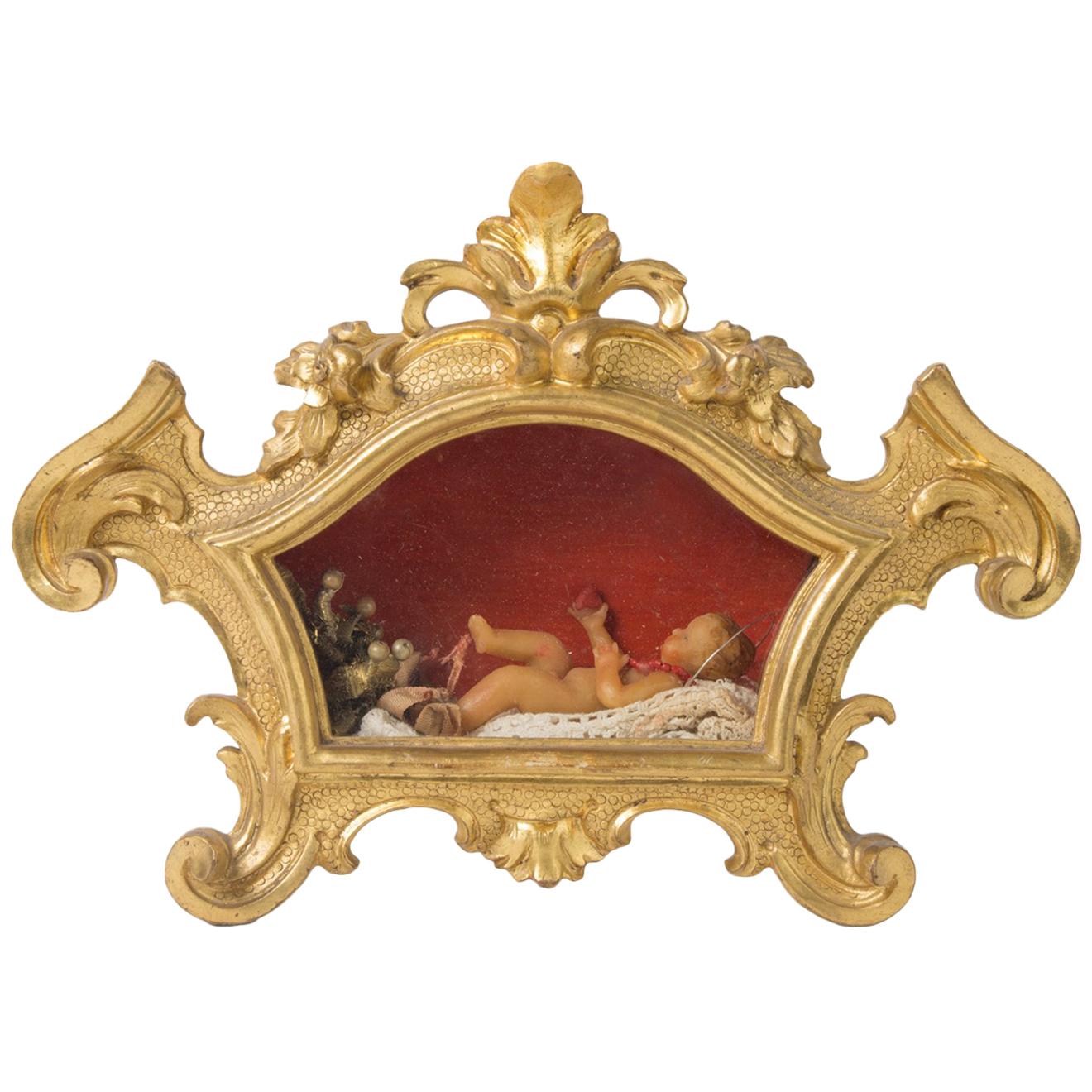 Baby Jesus Christ in Wachs in einem vergoldeten Reliquary aus dem frühen 19. Jahrhundert