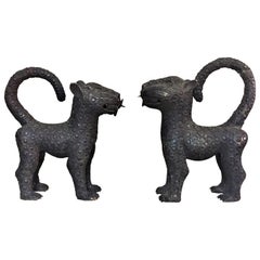 Tibetan Guardian Leopards, a Matching Pair of Patinated Bronze Sculptures