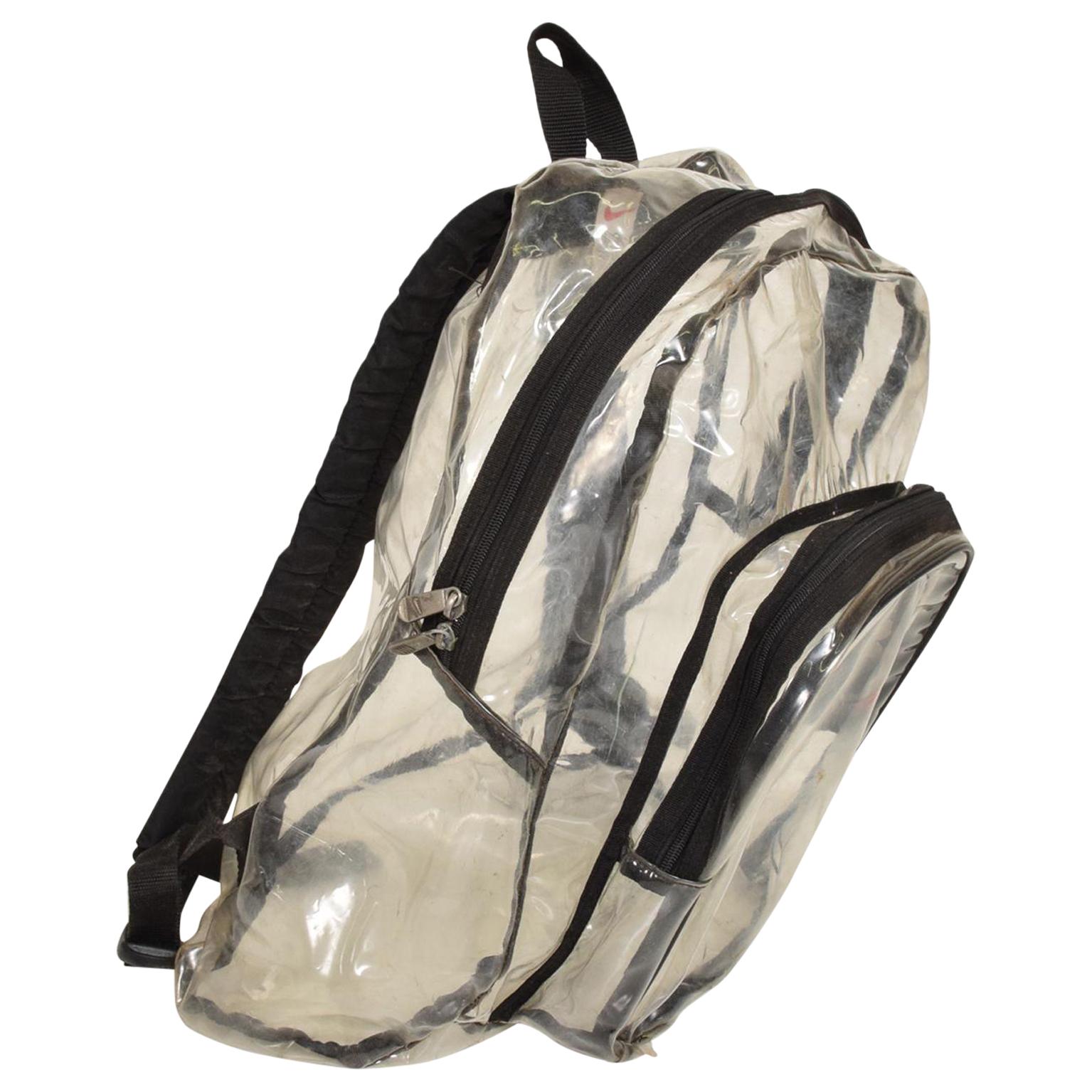 From AMBIANIC
Vintage NIKE Vinyl Backpack Clear See-Through Advertising.
Made in Mexico for Nike 1980s
Dimensions: 17 H x 10 D x 13D
Preowned original unrestored fair vintage condition
See images