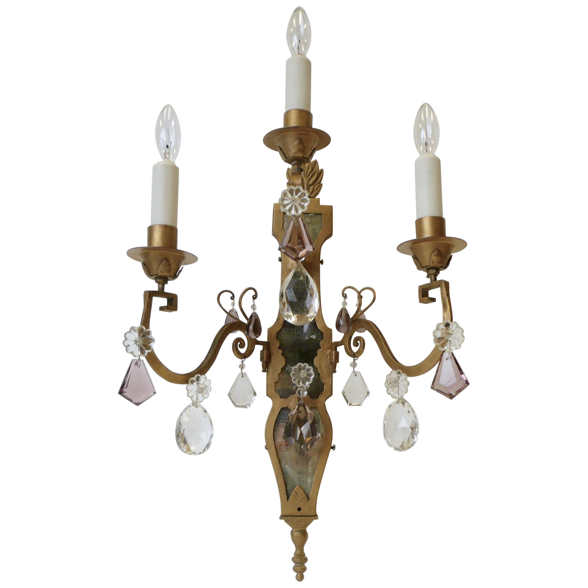 Pair of E. F. Caldwell Gilt Wrought Iron, Mirror and Crystal Sconces For Sale