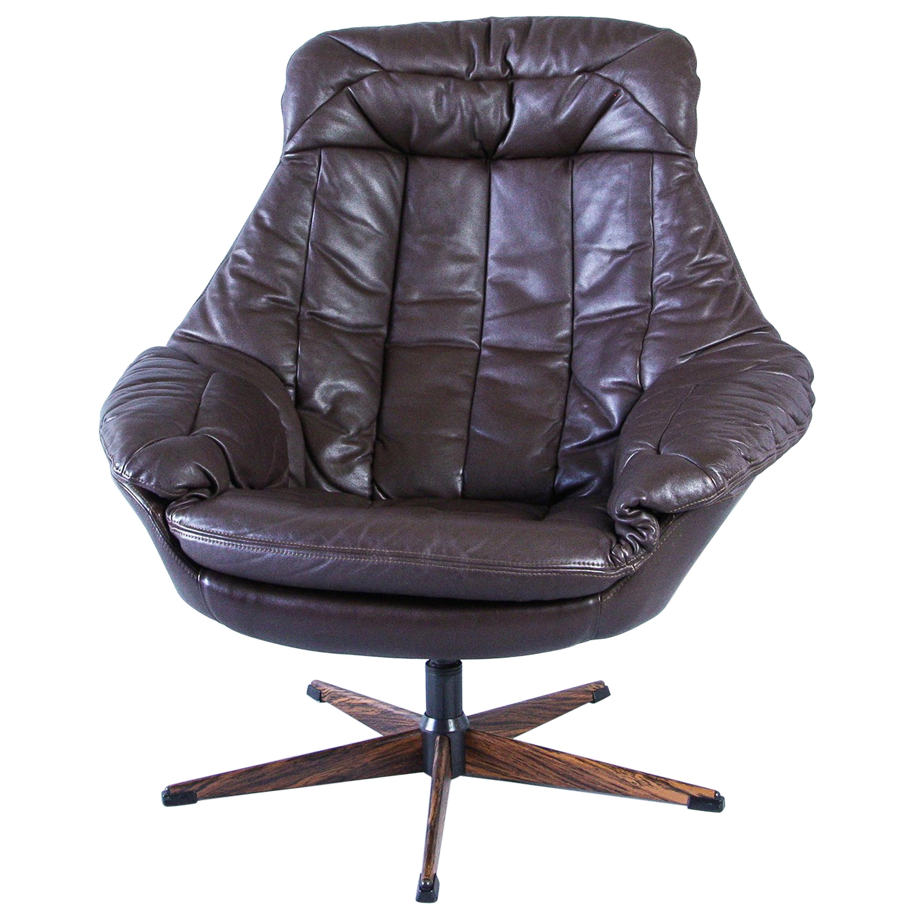 H.W Klein Leather Swivel Armchair