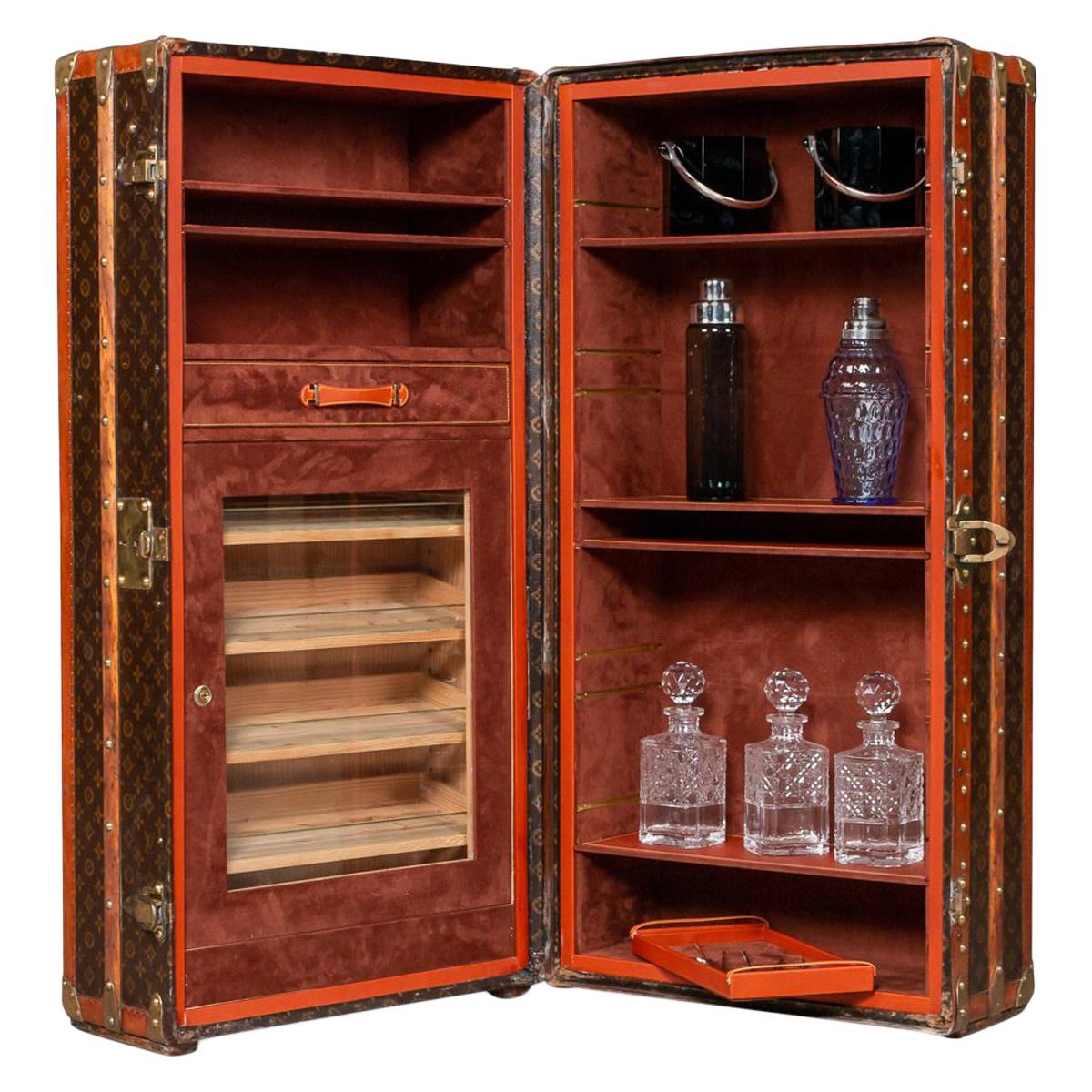 LOUIS VUITTON. A VERY FINE WARDROBE TRUNK WITH HUMIDOR AND DISPLAY SHELVES,  CUSTOMIZED BY BERNARDINI LUXURY VINTAGE