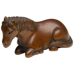 Japanese Wooden Netsuke of a Recumbent Horse, Early 19th Century