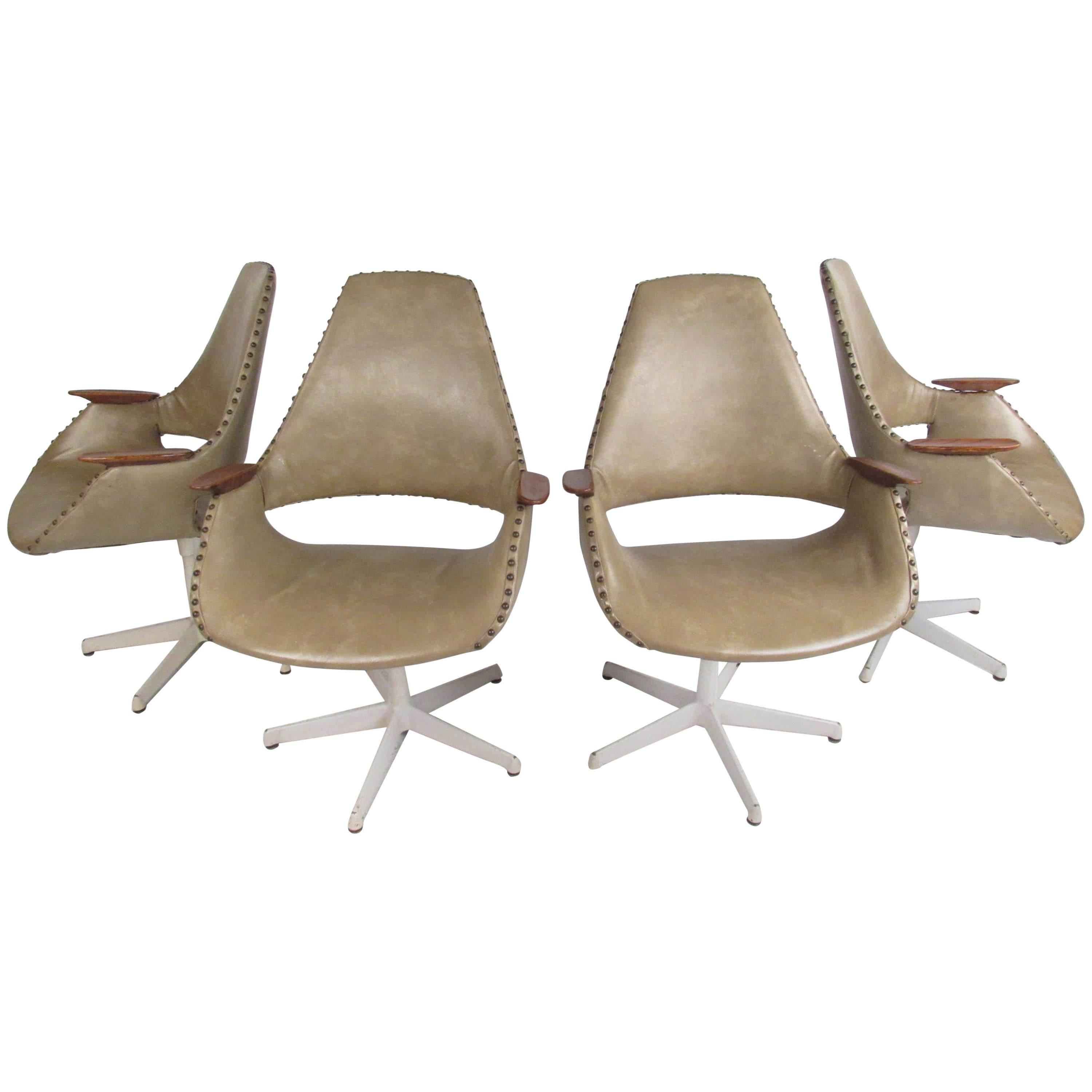 Set of Four Midcentury Swivel Armchairs For Sale