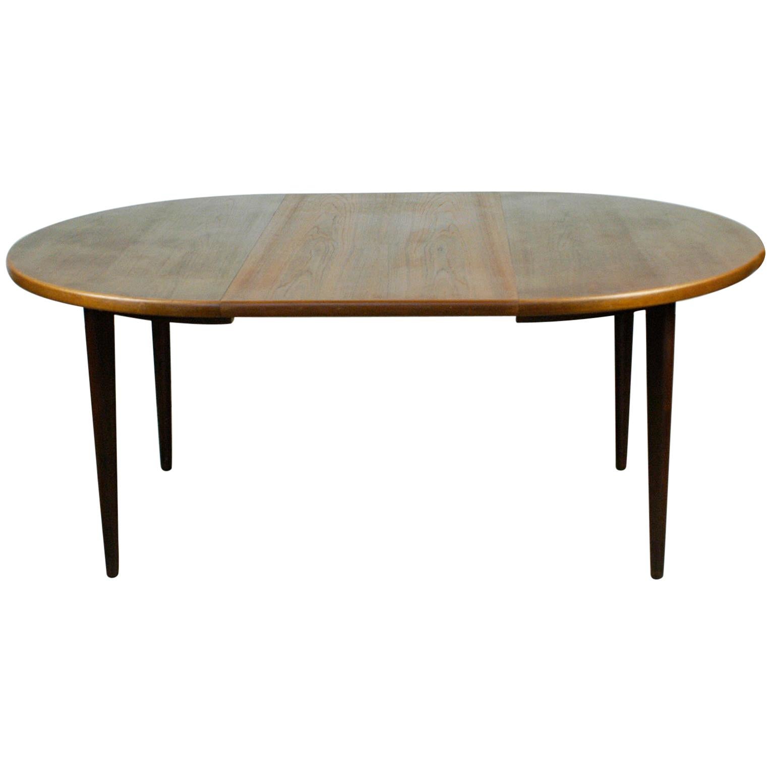 Scandinavian Circular Teak Dining Table with Two Extensions by  Niels Koefoeds