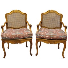 Pair of Vintage French Provincial Louis XV Style Cane Fauteuil Armchairs