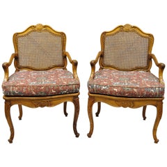 Pair of Vintage French Provincial Louis XV Style Cane Fauteuil Armchairs