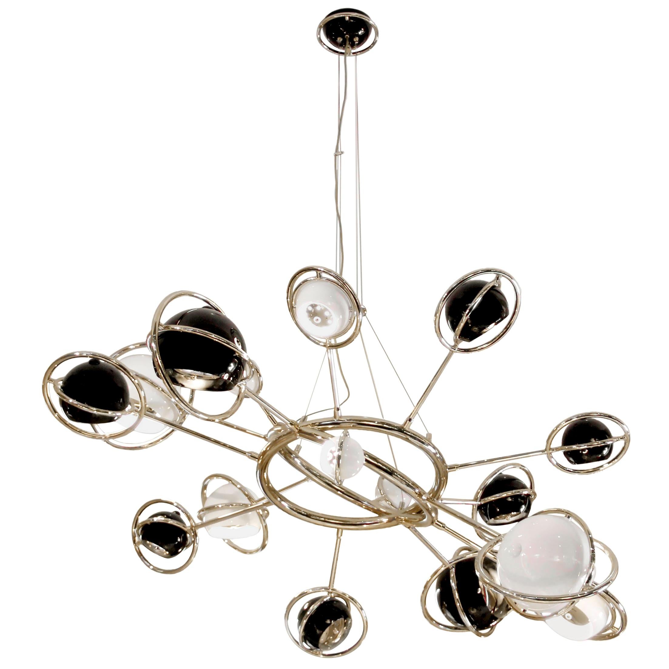 Cosmo Pendant Light in Brass and Steel with Black and White Globes For Sale