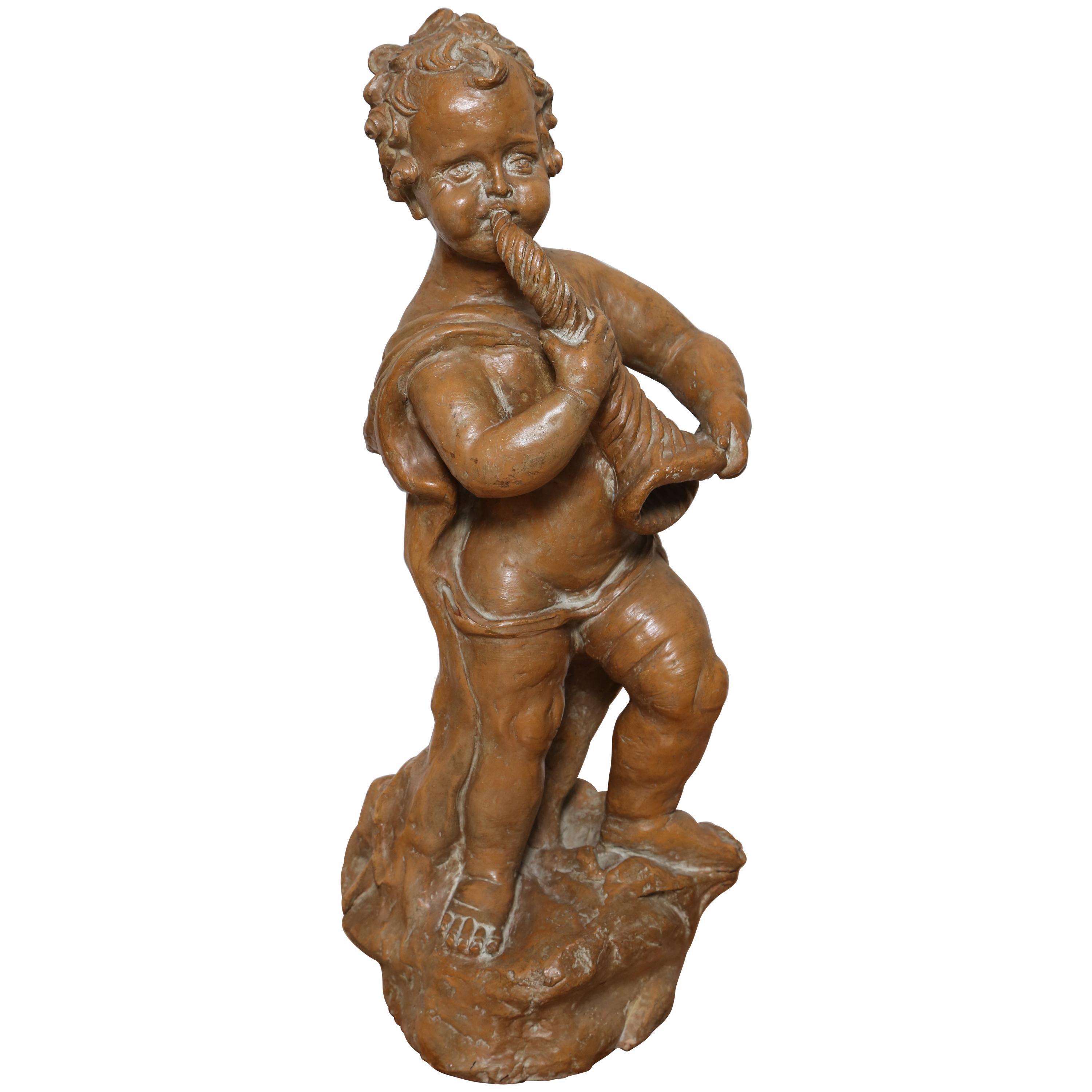 Terra Cotta Cherub with Horn For Sale at 1stDibs