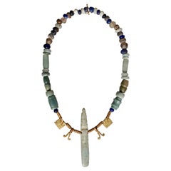 Collier de hache en jade pré-colombien:: dieu celte et pendentif en or