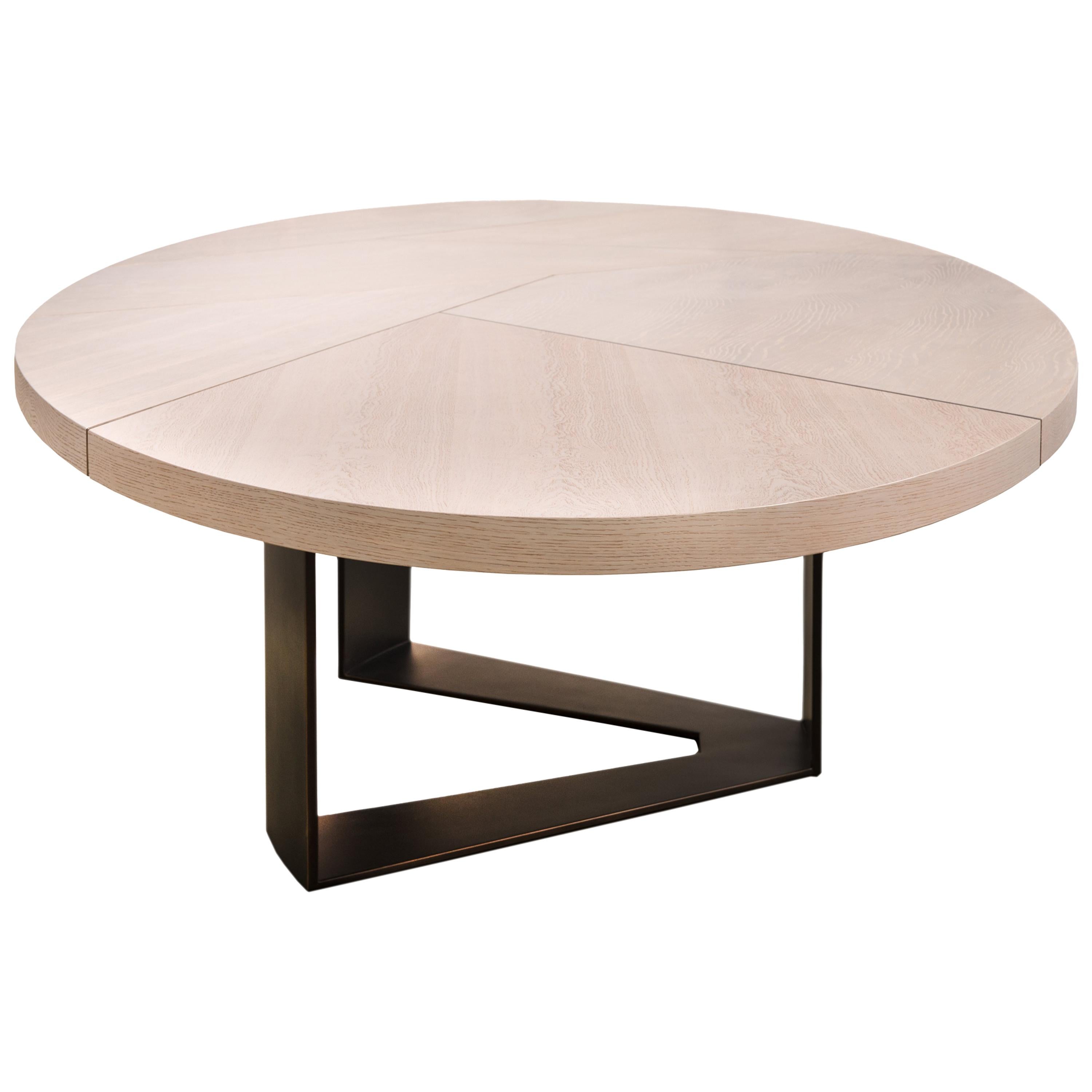 Create a casual dining setting with the Aurora Dining Table and watch it bring a sense of style and industrialism to your dining room.

The Aurora Dining Table uses the trilateral base of the Aurora Coffee Table, its predecessor. The wide timber top